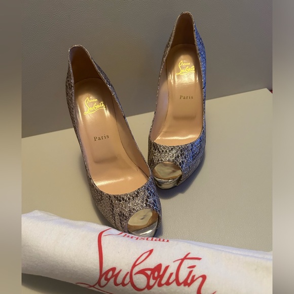 CHRISTIAN LOUBOUTIN
Animal Print Glitter Accents Pumps - Picture 13 of 13